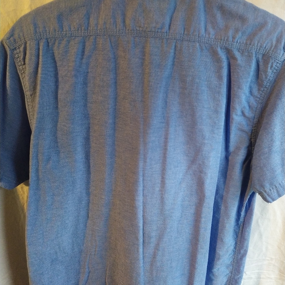Shirt sleeve Levi's jean shirt.